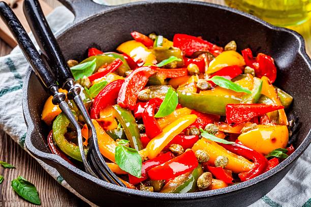 istock Italian cuisine, peperonata: roasted bell pepper with capers and basil 528496268