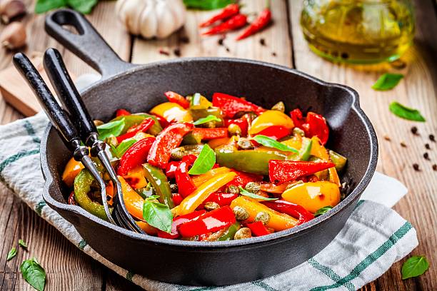 istock Italian cuisine, peperonata: roasted bell pepper with capers and basil 528496306