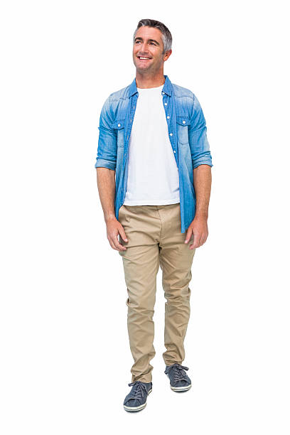 istock Smiling man in casual clothes posing 528497473