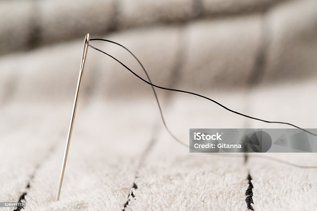 Sewing needle Detail of a needle with thread things Art And Craft Stock Photo