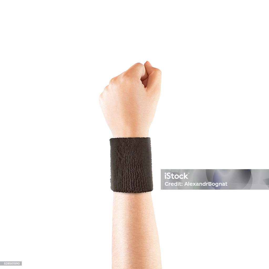 Blank black wristband mockup on hand, isolated Blank black wristband mockup on hand, isolated. Clear sweat band mock up design. Sport sweatband template wear on wrist arm. Sports support protective bandage wrap. Bangle on the tennis player hand. Wristband Stock Photo