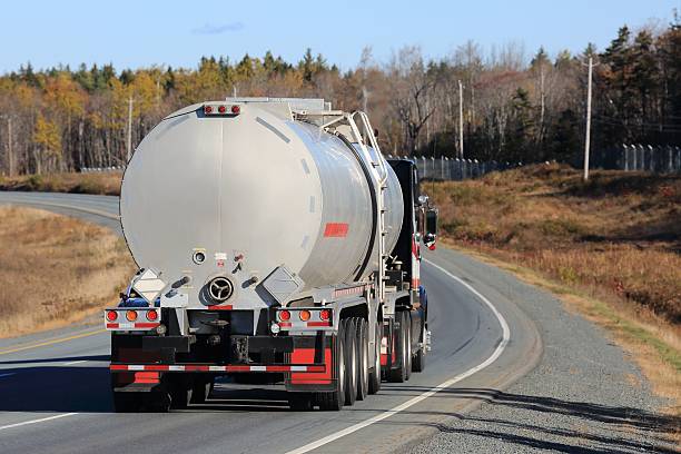 istock Tanker truck delivering its load. 528502150