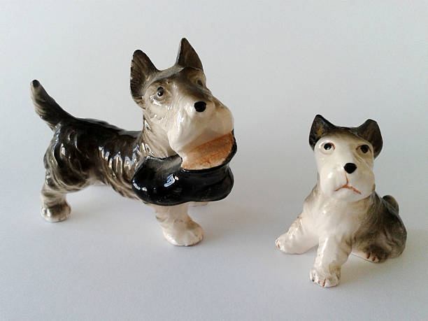 istock Miniature Schnauzer Porcelain Figurines 528527715