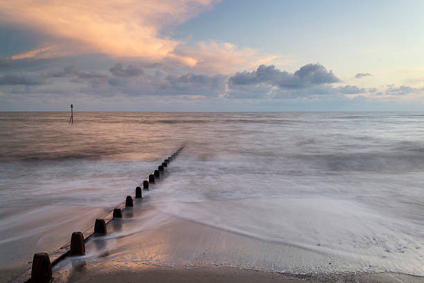 istock Beautiful long exposure vibrant concept image of ocean at sunset 528528993