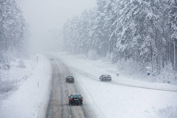 istock Car driving on snow road 528529517