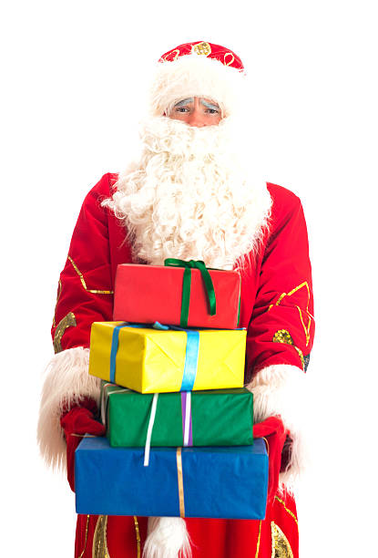 istock Santa Claus with gifts. Isolated on white. 528530245