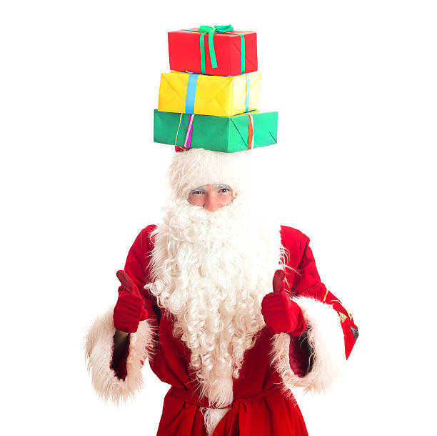 istock Santa Claus with gifts on his head. 528530249