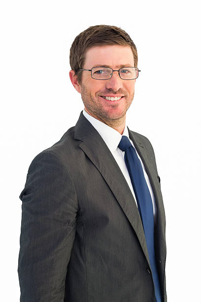 istock Handsome businessman smiling at camera 528534189