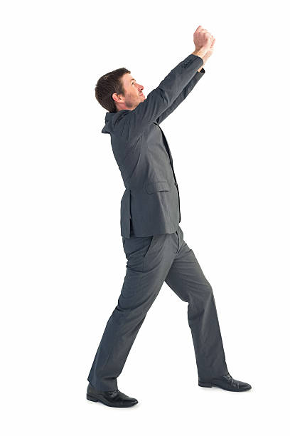 istock Businessman with his hands up 528534361