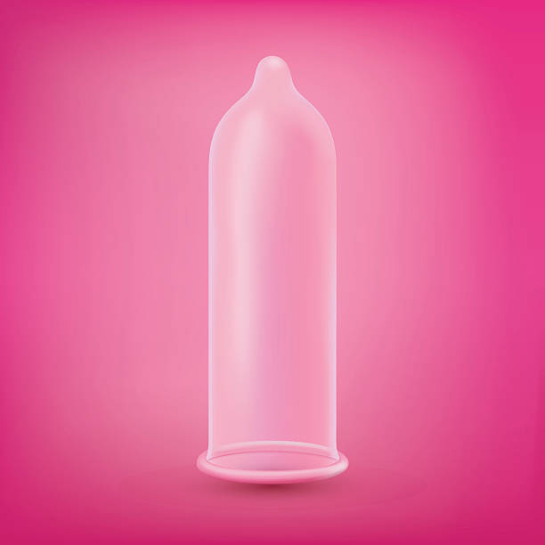 stockillustraties, clipart, cartoons en iconen met latex condom over pink background - condoom