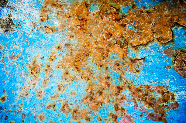 istock Old shabby paint on metal. 528556154