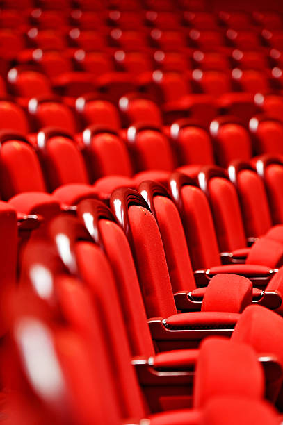 istock Rows of empty red velvet seats 528556902