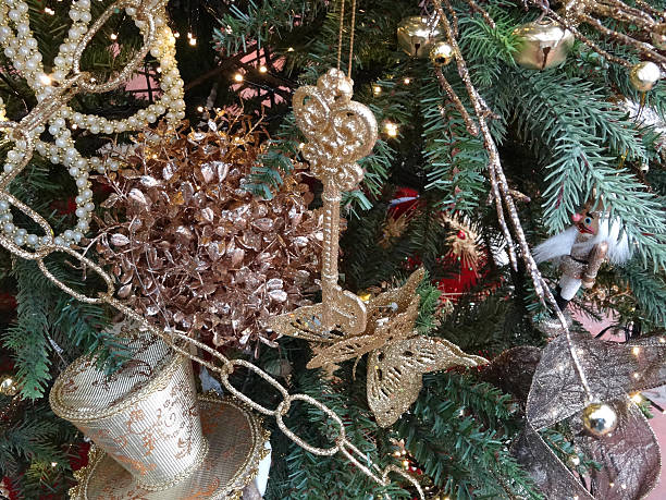 istock Artificial Christmas-tree, gold and silver decorations, ornaments, tinsel, chain, fairy-lights 528557903