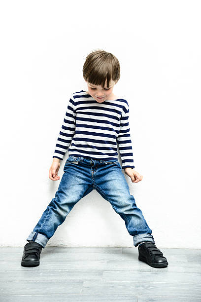 istock happiness little kid against the white wall 528558478