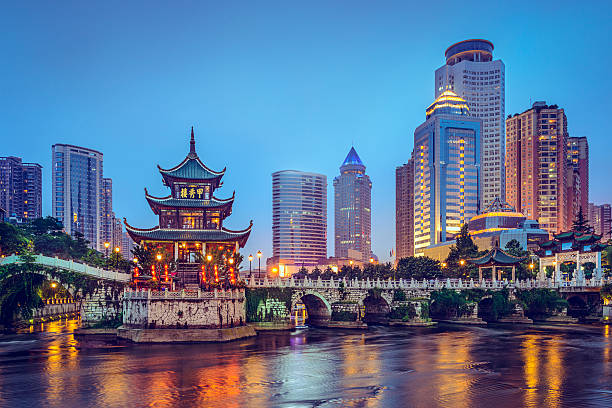 Guiyang, China Guiyang, China skyline at Jiaxiu Pavilion on the Nanming River. prc stock pictures, royalty-free photos & images