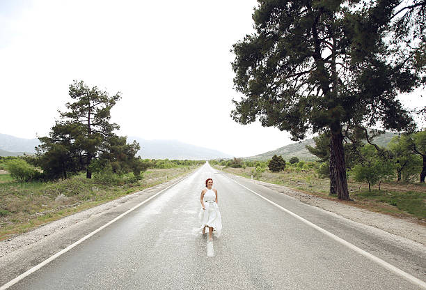 bride running on the road