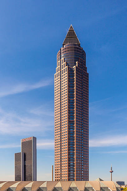 Frankfurt, Germany - May 6, 2016: The Trade Fair Tower Messeturm and the Marriott hotel next to Frankfurt Trade Fair Grounds seen from the roof garden of Skyline Plaza Mall.