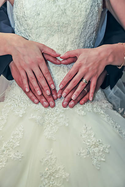istock bride and groom hug, wedding dress 528560932