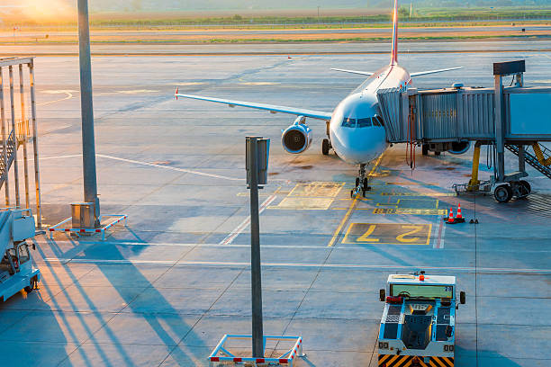 istock Airplane in airport before take-off at dawn 528561193