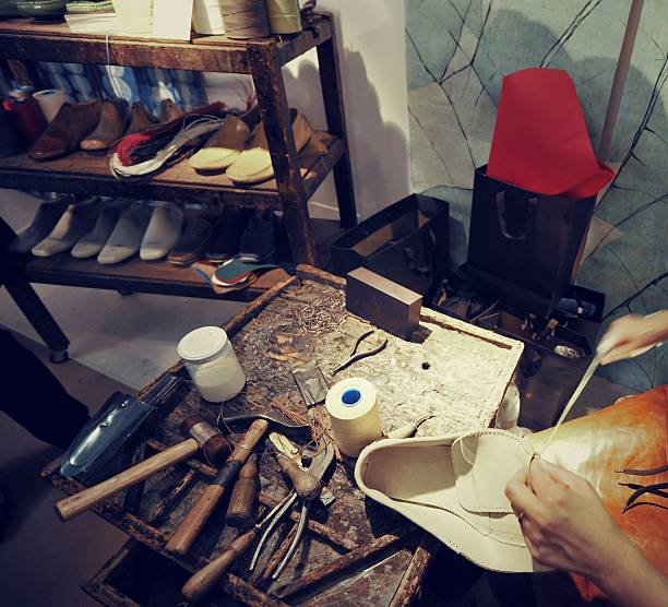 istock craftsman making luxury handmade man shoes 528561228