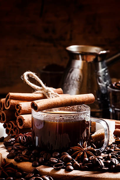 istock Black sweet coffee with cinnamon and anise 528561560