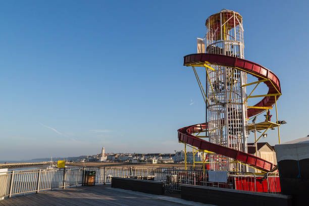 Helter skelter on the pier in Herne Bay, Kent Helter skelter on the pier in Herne Bay, Kent herne bay photos stock pictures, royalty-free photos & images