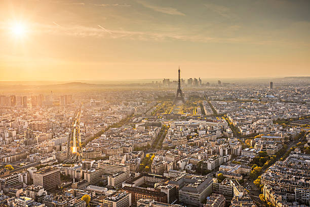 Sunset in Paris Panorama view of Paris at sunset. ile de france stock pictures, royalty-free photos & images