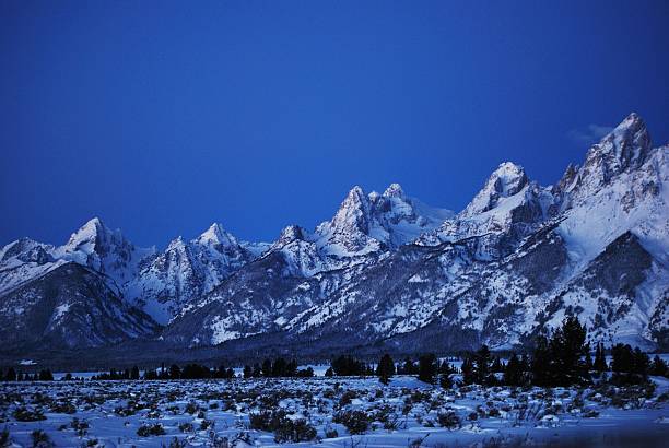 istock Snow Covered Grand Tetons at Night 528565168