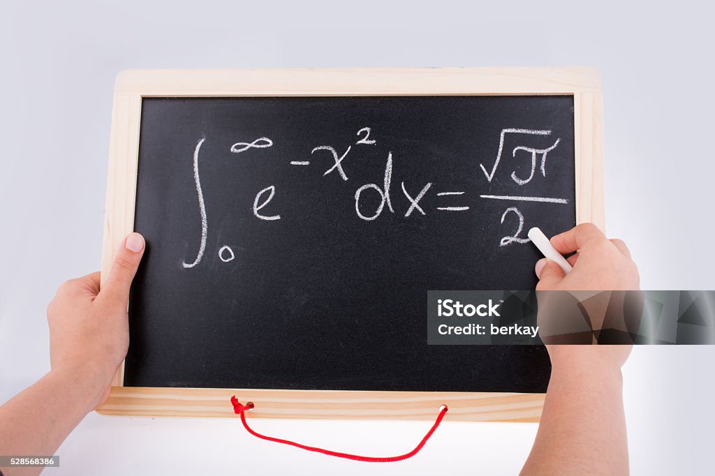 Istock Math Problems Hand Writing A Math Problem On Board Stock Photo - Download Image Now ...