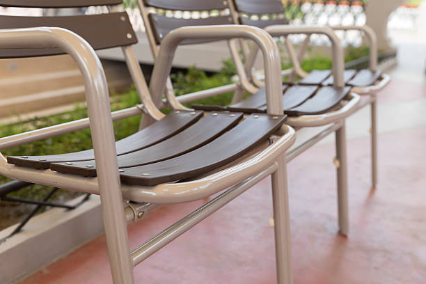 istock brown plastic chair in the park 528568782