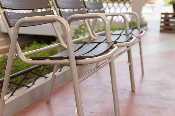 istock brown plastic chair in the park 528570092