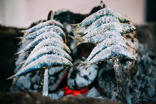Espetos - skewer with sardines in a fire. Spanish cuisine