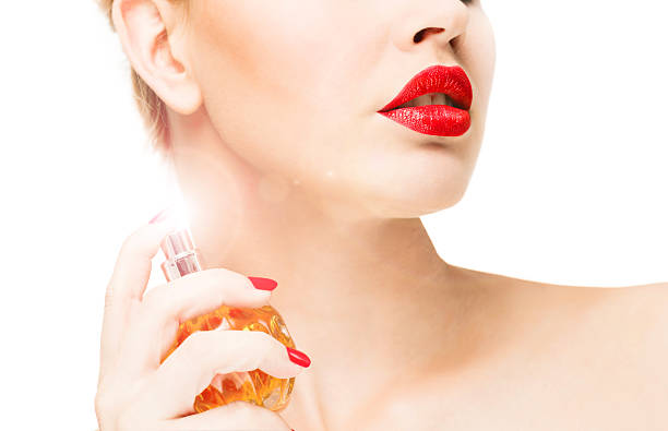 Someone Using Perfume 60+ Young Woman Spraying Perfume On A Wrist Stock Photos, Pictures ...