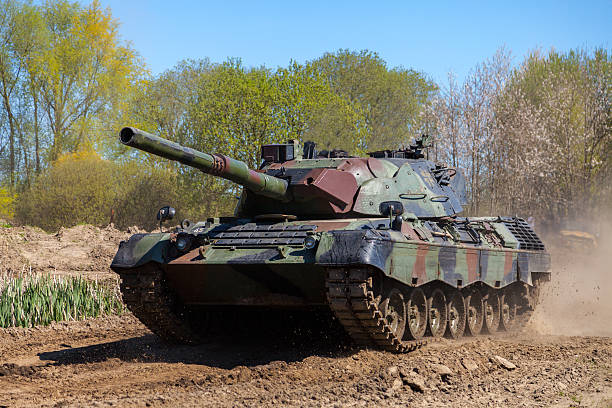 german leopard 1 a 5 tank drives on track Grimmen, Germany - May 5, 2016: german leopard 1 a 5 tank drives on track on a motortechnic festival on may 5, 2016 in Grimmen / Germany. armored tank stock pictures, royalty-free photos & images