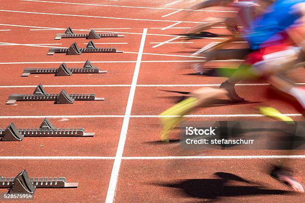 Sprint Start In Blurred Motion Stock Photo - Download Image Now - Running, Sports Race, Running Track