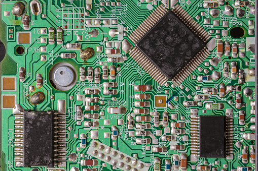 Close-up shot of an old and used integrated circuit board