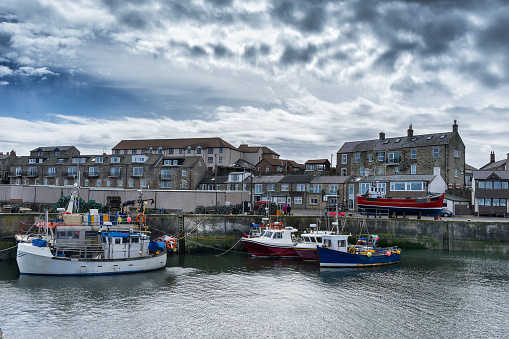 Fishing boats in Seahouses Harbour in Northumberland