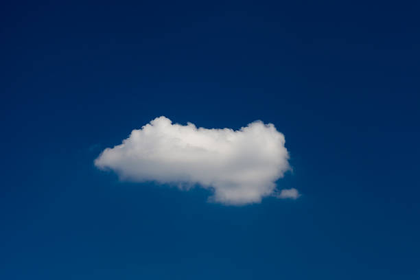 istock one cumulus cloud on a blue sky background 528578354