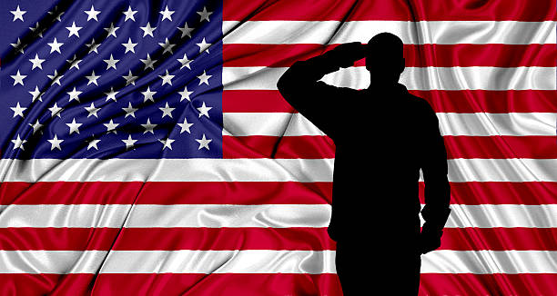 istock Saluting to USA flag 528578744