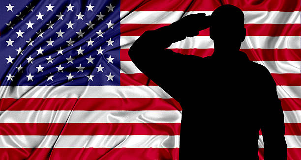 istock Saluting to USA flag 528578798