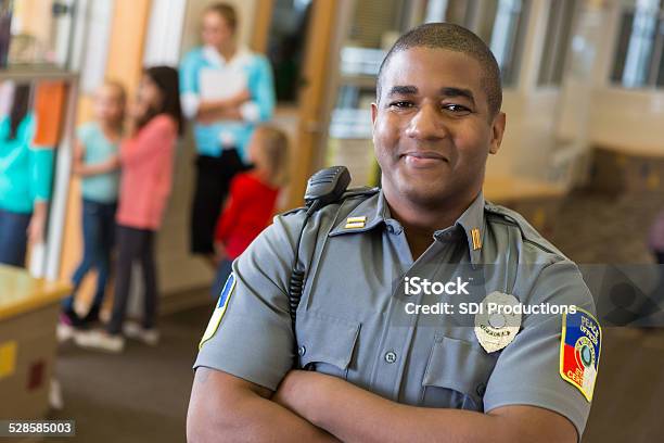 Friendly School Security Guard Working On Elementary School Campus Stock Photo - Download Image Now