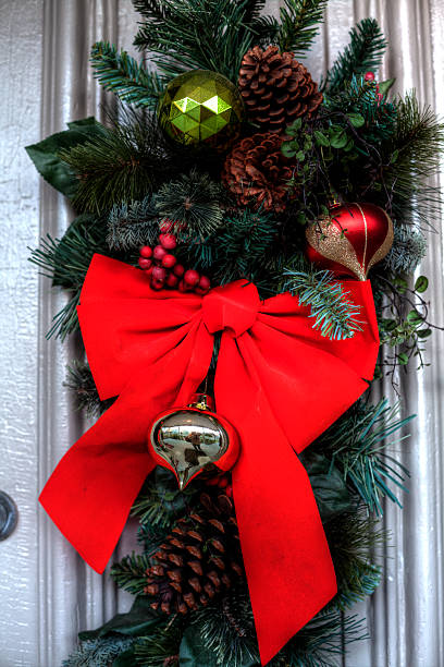 istock Christmas wreath and red ribbon 528585059