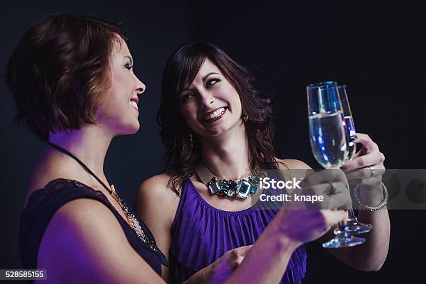 Friends Celebrating With Champagne Stock Photo - Download Image Now - Elegance, Formalwear, Friendship