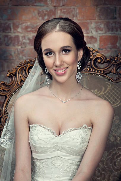 istock Bride in wedding dress and veil 528586015