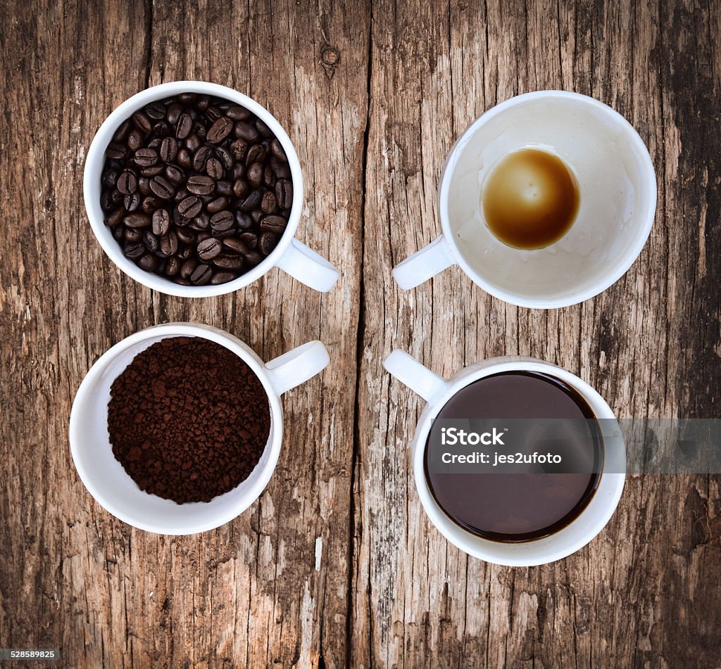 coffee in cup on old wooden table (Vintage-Style) Aromatherapy Stock Photo