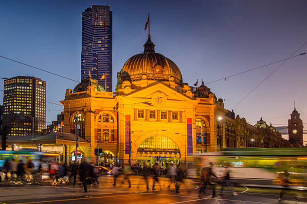 Flinders Street Station Flinders Street Station in Melbourne, Australia at dusk. melbourne australia stock pictures, royalty-free photos & images