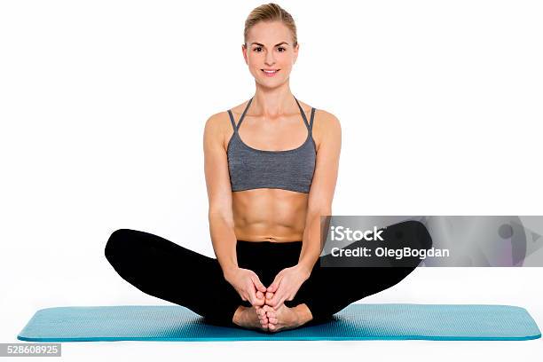 Young Fitness Woman Practicing Yoga On White Background Stock Photo - Download Image Now