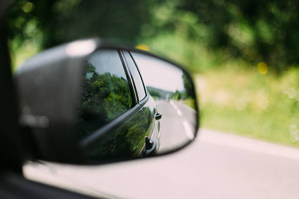 istock View From Car Window on Mirror. Travel Concept 528608926