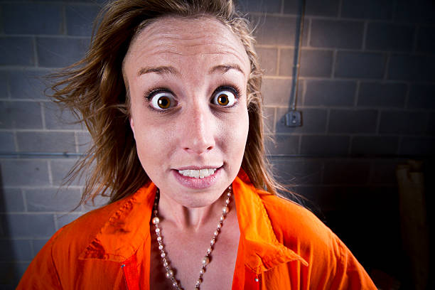 Girl Prisoner with Funny Face stock photo