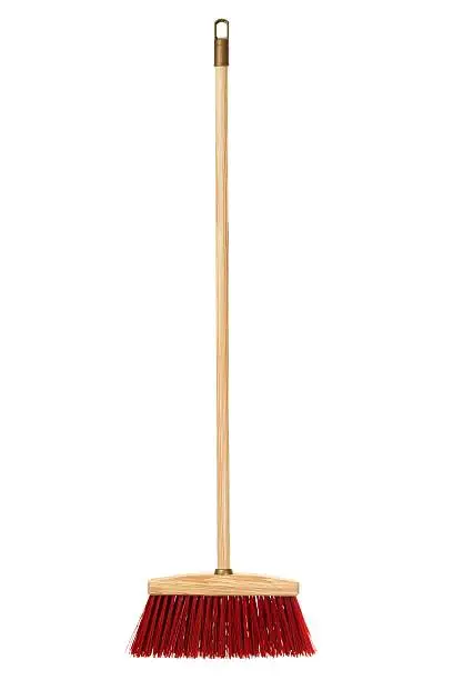 Big wooden broom isolated on white background